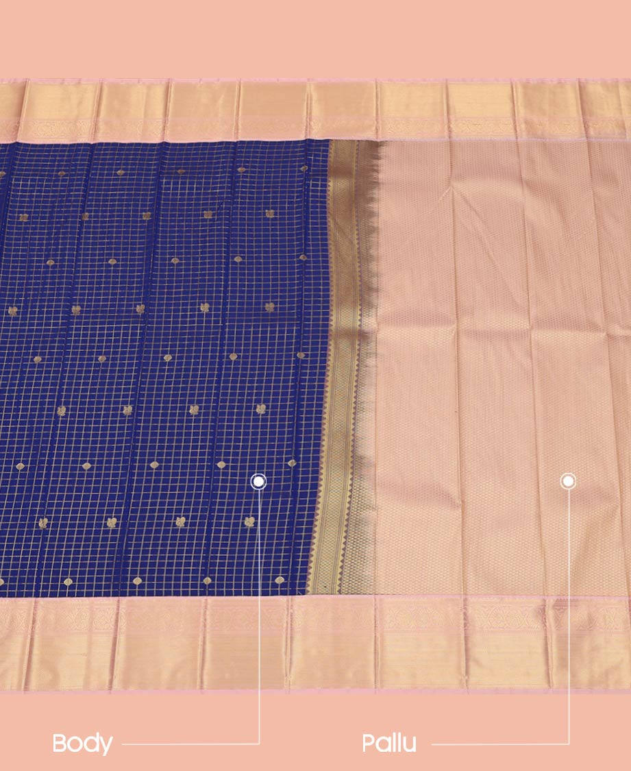 Blue Budget Silk Saree Gleamed Up with Peacock Chakram Buttas and Micro Checks, Complemented by a Contrast Traditional Zari Motifs Border, Pallu Decked Up with Zari, and Paired with a Contrast Blouse