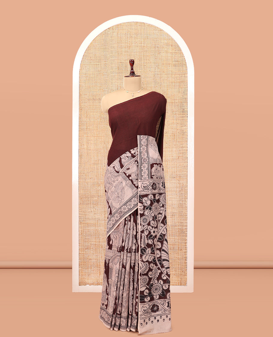 Brown Kalamkari Cotton Saree, Accentuated with Ancient Human Motif Print,  Complemented By Printed Border, Kalamkari Peacock Motifs Pallu, and a Contrast Blouse