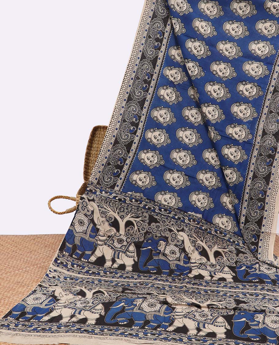 Blue human motifs machine printed kalamkari cotton saree with contrast peacock border & forest design pallu