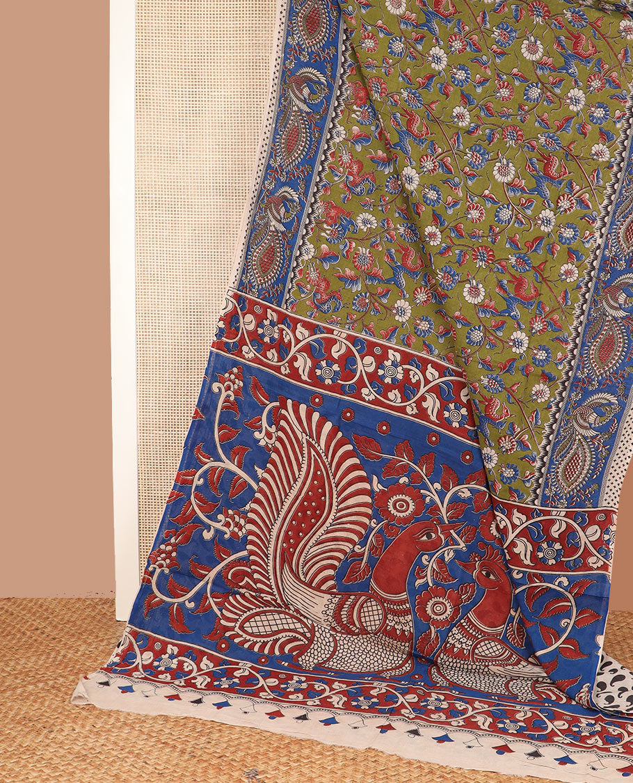 Green floral vine and deer motifs machine-printed kalamkari cotton saree, contrast peacock printed border, and pallu of peacock print