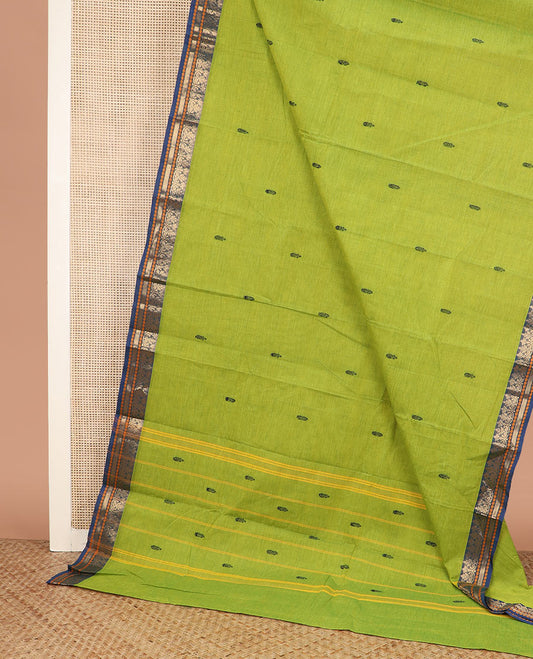 Leaf green buttas Chettinad cotton saree, contrast traditional design border, and striped pallu