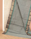 Grey medium-sized checked Chettinad cotton saree, contrast temple border of paisleys, and striped pallu