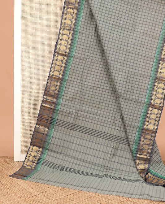 Grey medium-sized checked Chettinad cotton saree, contrast temple border of paisleys, and striped pallu