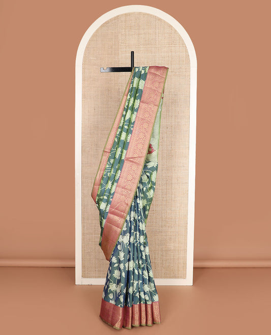 Blue Lotus vine and Pichwai cow printed semi-banaras patola silk saree, contrast floral creeper zari border, and pallu of big peacock motifs