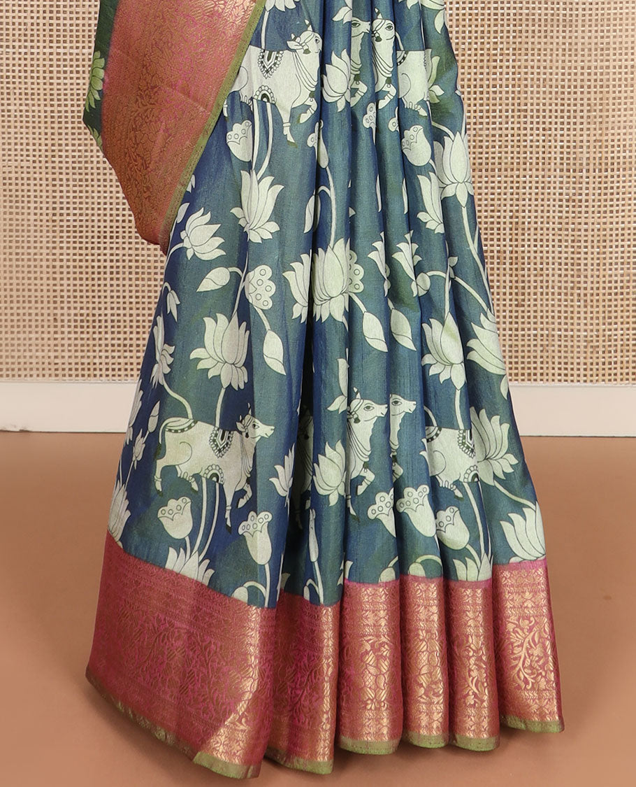 Blue Lotus vine and Pichwai cow printed semi-banaras patola silk saree, contrast floral creeper zari border, and pallu of big peacock motifs