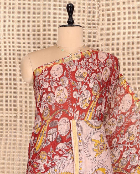 Red Machine-Printed Kalamkari Cotton Saree Features Instrument, Floral, and Fauna Motifs, a Contrast  Border, Pallu of Peacock, and a Matching Blouse
