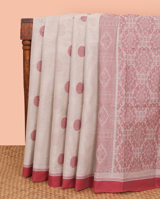 Off-White Kanchi Cotton Saree, Gleamed Up with Polka Dot Buttas All Over Its Body, Complemented by a Contrast Border, Pallu Features Intricate Designs, and Paired with a Matching Blouse