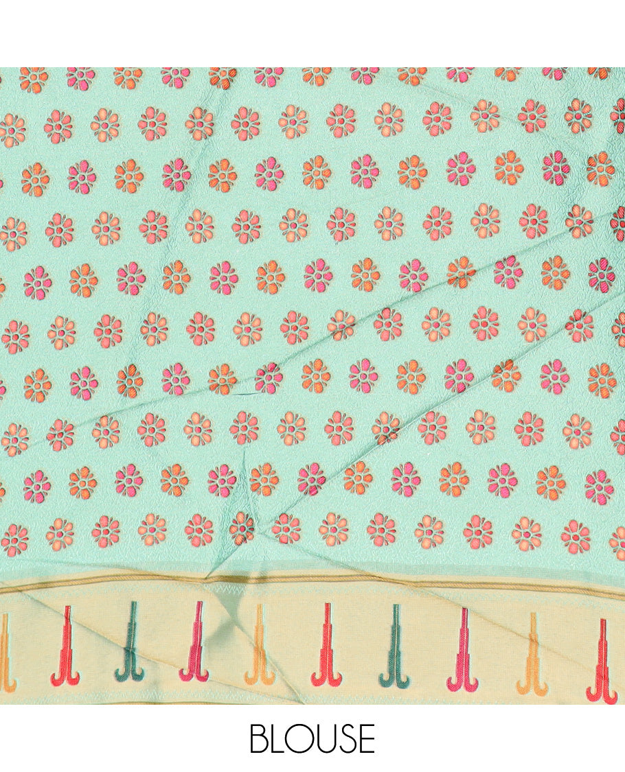 Pastel green colorful floral vine printed dola silk saree, muniya border, and tropical floral printed pallu