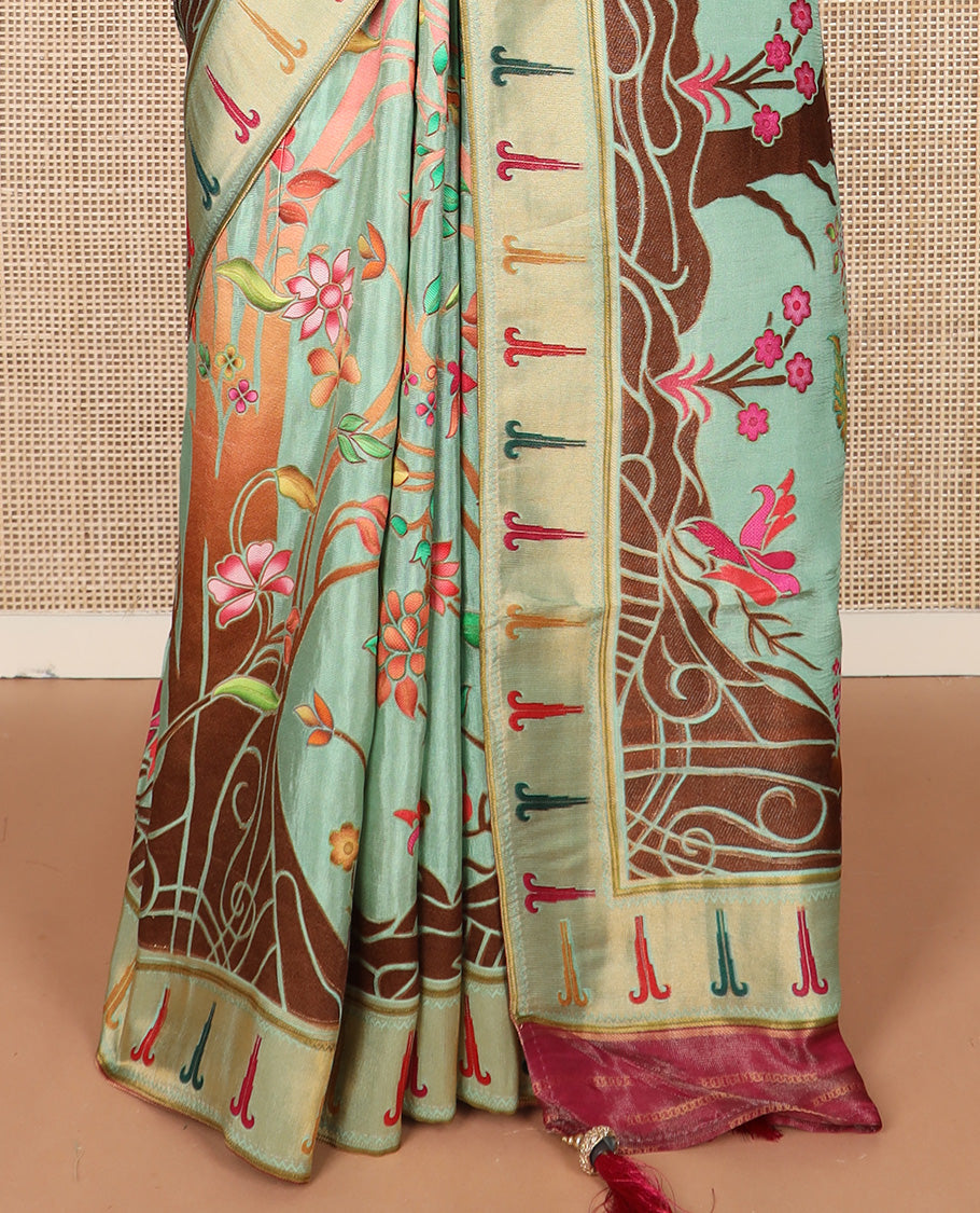 Pastel green colorful floral vine printed dola silk saree, muniya border, and tropical floral printed pallu