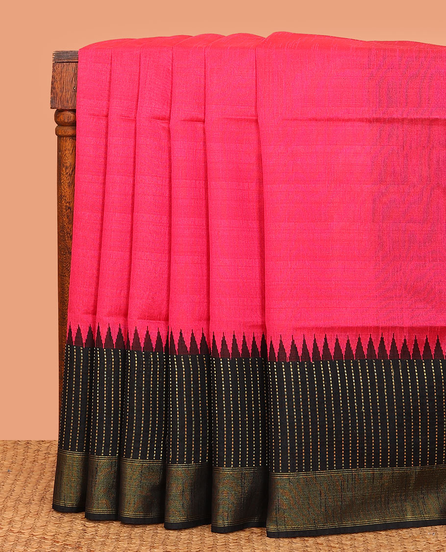 Pink plain dupion saree, contrast zari striped temple border, and zari striped pallu