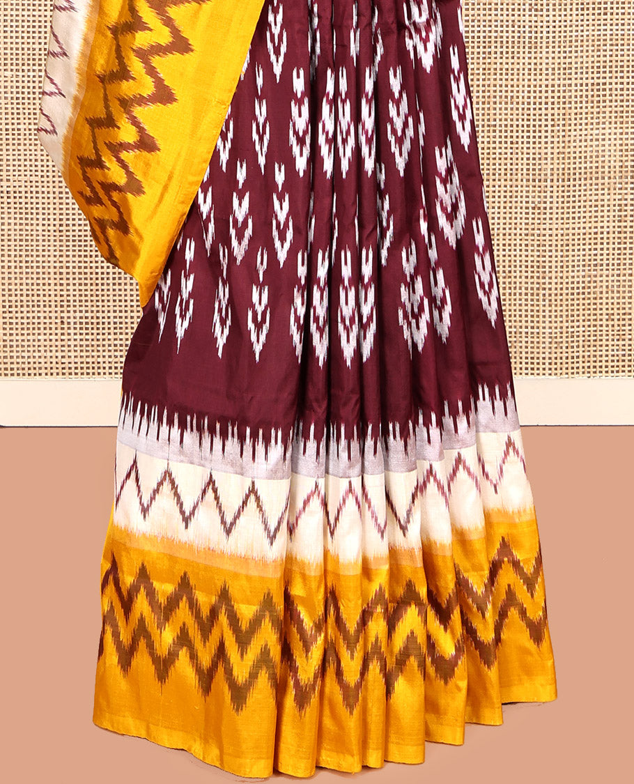 Maroon Pochampally Ikat Silk Saree, Delicately Woven with Buttas, Complemented by a Contrast Border, Ikat-Style Jaal Pallu, and Contrast Blouse