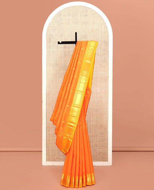 Orange Kanchipuram Silk Saree, Embellished with Zari Buttas, Contrast One-Sided Border of Paneer Sombu, Banaras, Muthu, and Mayil Kann Design, Zari Design Pallu, and No Blouse