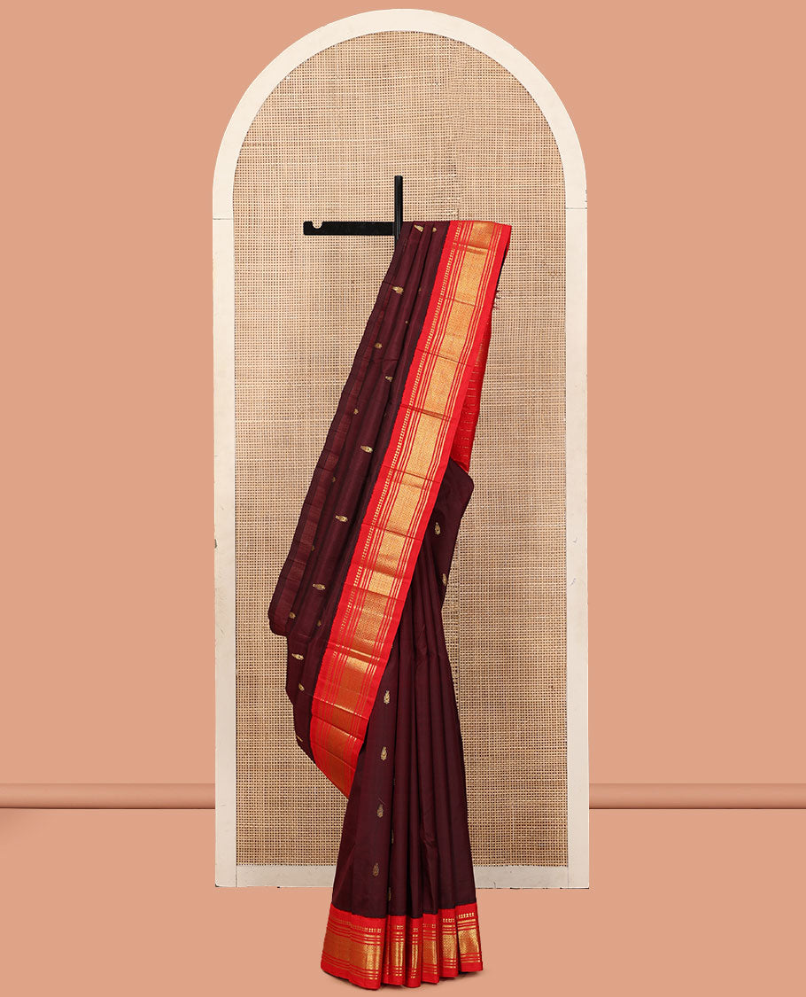 Maroon Kanchipuram Silk Saree, Woven with Zari Buttas, a Contrast One-Sided Korvai Border of Panner Sombu, Banaras, Muthu, and Mayil Kann Designs, a Zari Design Pallu, and No Blouse