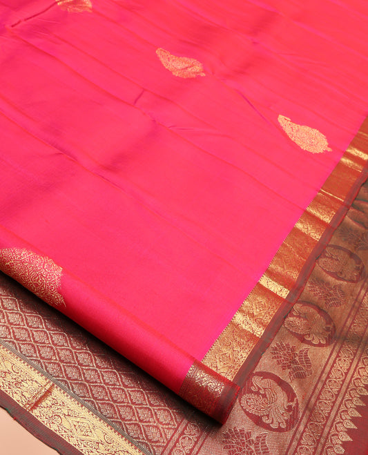Pink Kanchipuram Silk Saree, Elevated with Manga Buttas All Over Its Body, Complemented by Contrast Border of Salngai, Diamond, and Manga Designs, Pallu of Jaal Design, and Paired with a Contrast Blouse