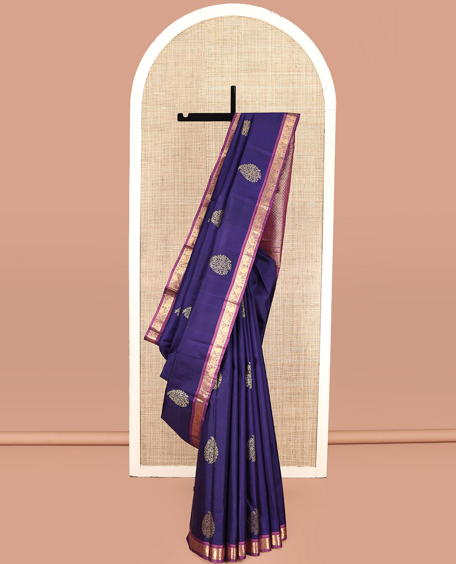Blue Kanchipuram Silk Saree, Elevated with Zari Buttas All Over Its Body, Complemented by a Contrast Border of Rekku, Muthu, Manga, and Yaanai Designs, Grand Jaal Pallu, and Paired with a Contrast Blouse