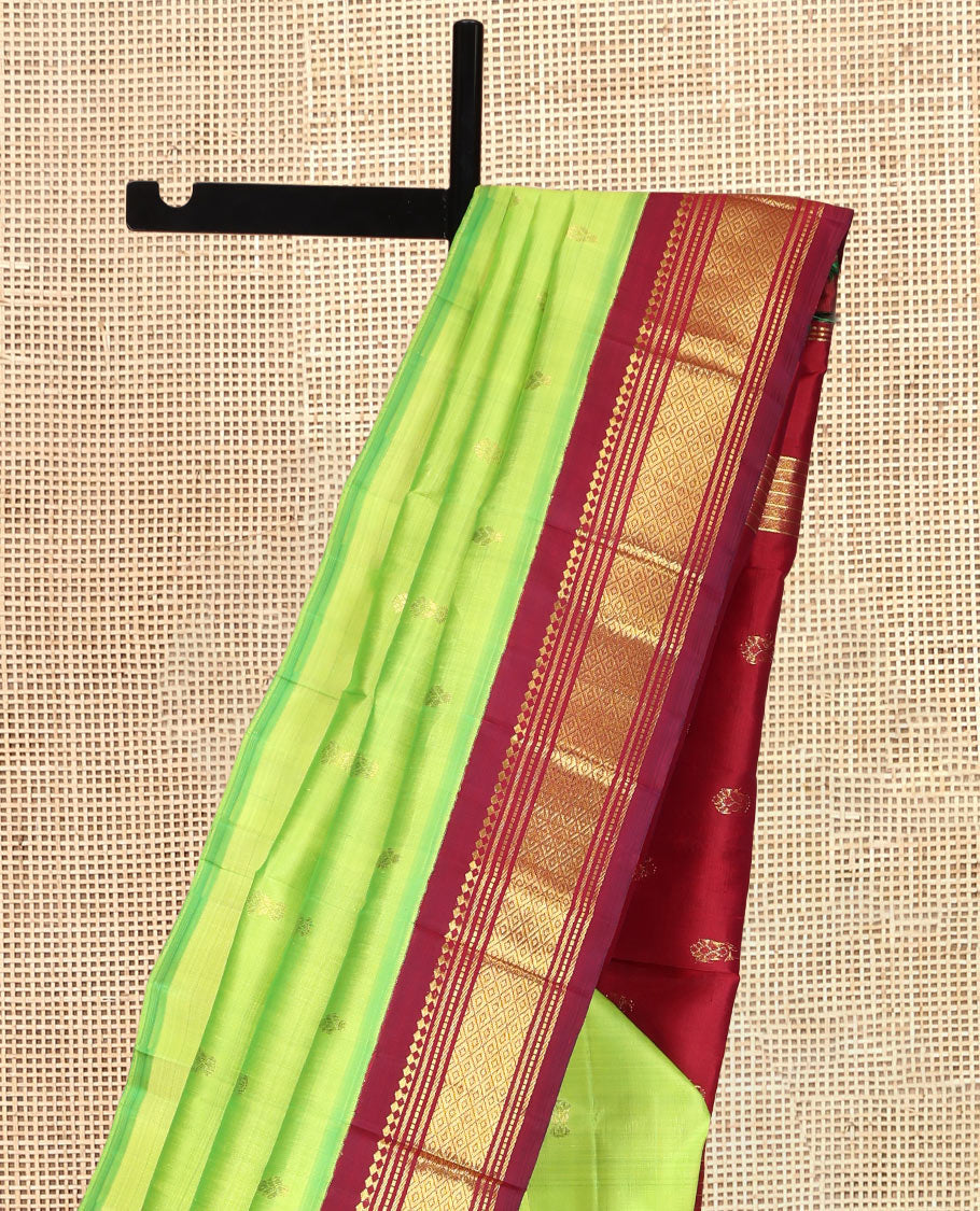 Green Kanchipuram Silk Saree, Woven with Zari Buttas, a Contrast One-Sided Korvai Border of Panner Sombu, Banaras, Muthu, and Mayil Kann Designs, Zari Design Pallu, and a No Blouse
