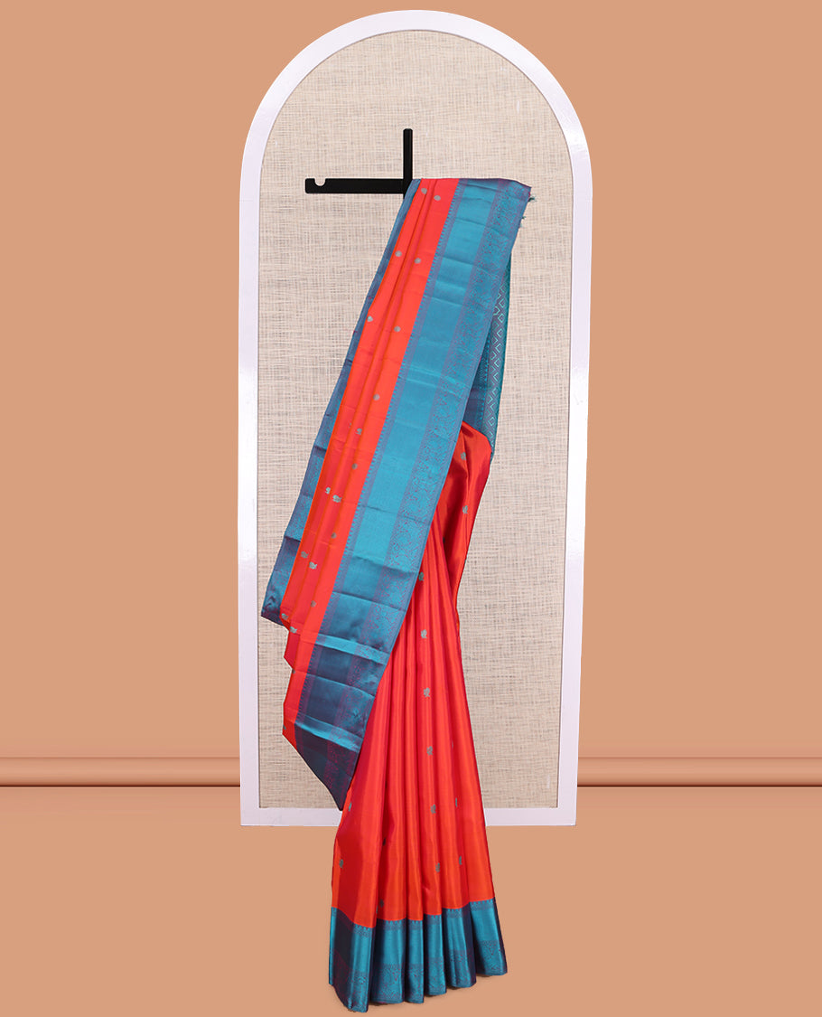 Orange Kanchipuram Silk Saree, Woven with Mayil-Chakram Buttas, Complemented by a Contrast Mayil Motif Woven Border, Jaal Pallu, and a Contrast Blouse