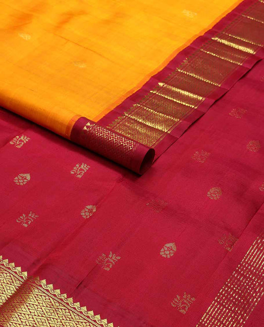 Orange buttas kancheepuram silk saree with contrast korvai zari design border & floral design pallu
