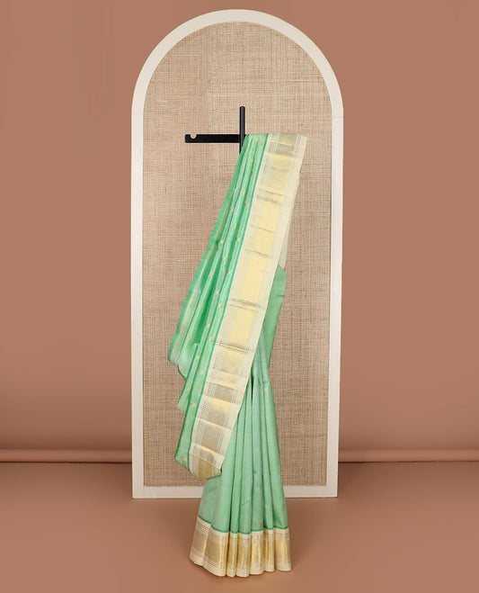 Turquoise buttas Kanchipuram silk saree, contrast border of panner sombu, banaras & mayil kann design & zari  design pallu