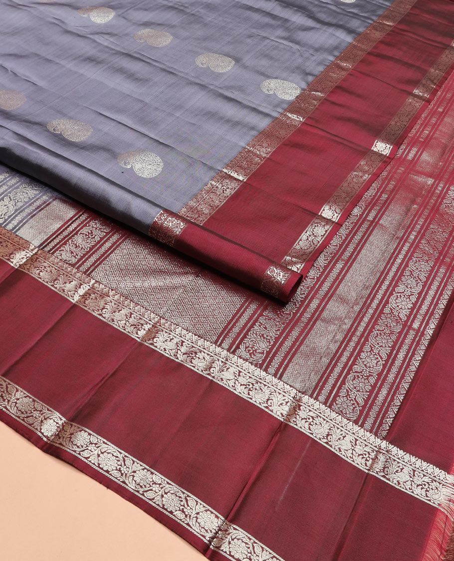 Grey manga buttas Kanchipuram silk saree, contrast rettai pettu border of mayil, and kodi visiry designs, and pallu of jaal designs