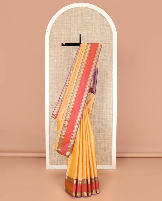 Light Orange Kanchipuram Silk Saree Embellished with Vazhaipoo Stripes, Complemented by Contrast Rettai Pettu Border of Rekku, Kathir, Muthu, and Jada Nagam Designs, Zari Woven Pallu, and Paired with a Contrast Blouse