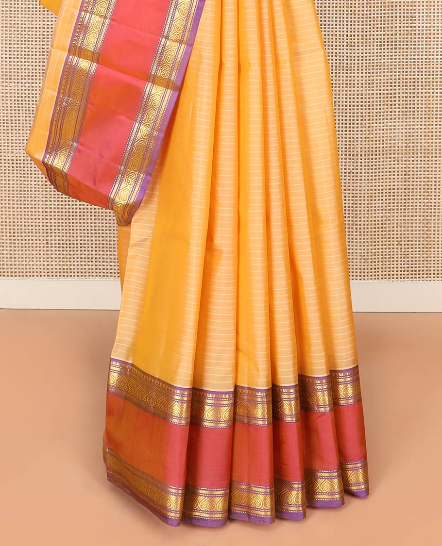 Light Orange Kanchipuram Silk Saree Embellished with Vazhaipoo Stripes, Complemented by Contrast Rettai Pettu Border of Rekku, Kathir, Muthu, and Jada Nagam Designs, Zari Woven Pallu, and Paired with a Contrast Blouse