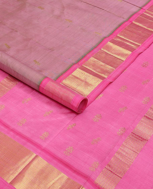 Pink kancheepuram silk saree with zari buttas, contrast one-sided vanki border & zari design pallu