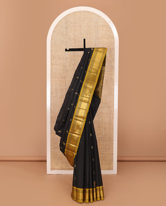 Black zari buttas Kanchipuram silk saree, contrast one-sided border of panner sombu,banaras,muthu & mayil  kann & four-petal floral motifs woven pallu