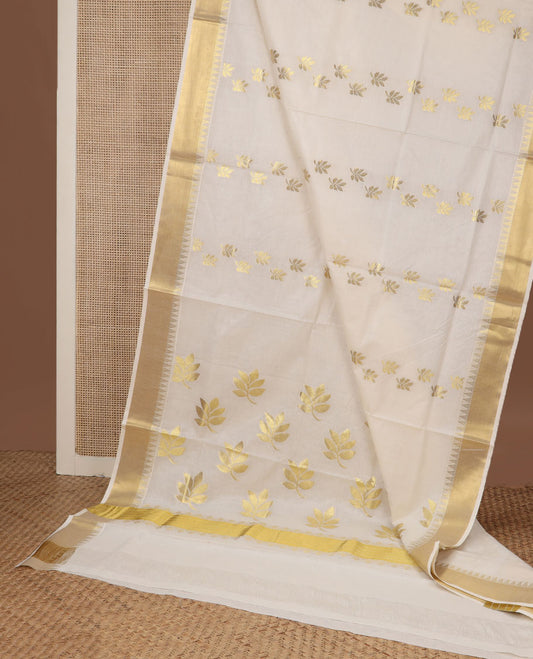 Cream leaf buttas Kerala saree, zari temple border, and pallu of leaf designs
