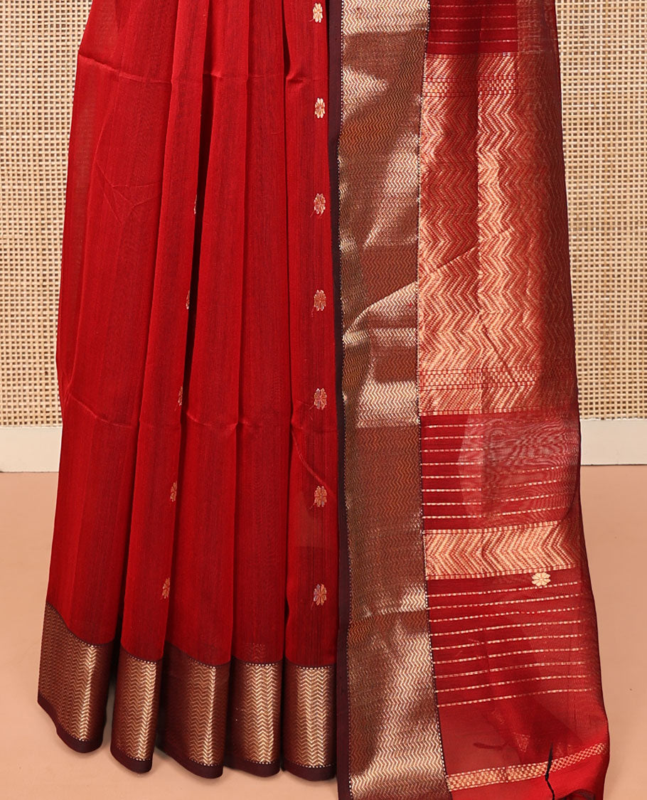 Red Maheshwari Cotton Saree, Spotlighted with Floral Zari Buttas on Its Body, Complemented by a Contrast Chevron Striped Zari Border, Pallu Woven in Chevron Stripes in Zari, and Paired with a Matching Blouse