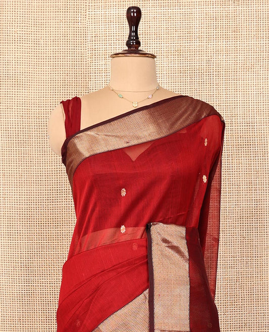 Red Maheshwari Cotton Saree, Spotlighted with Floral Zari Buttas on Its Body, Complemented by a Contrast Chevron Striped Zari Border, Pallu Woven in Chevron Stripes in Zari, and Paired with a Matching Blouse