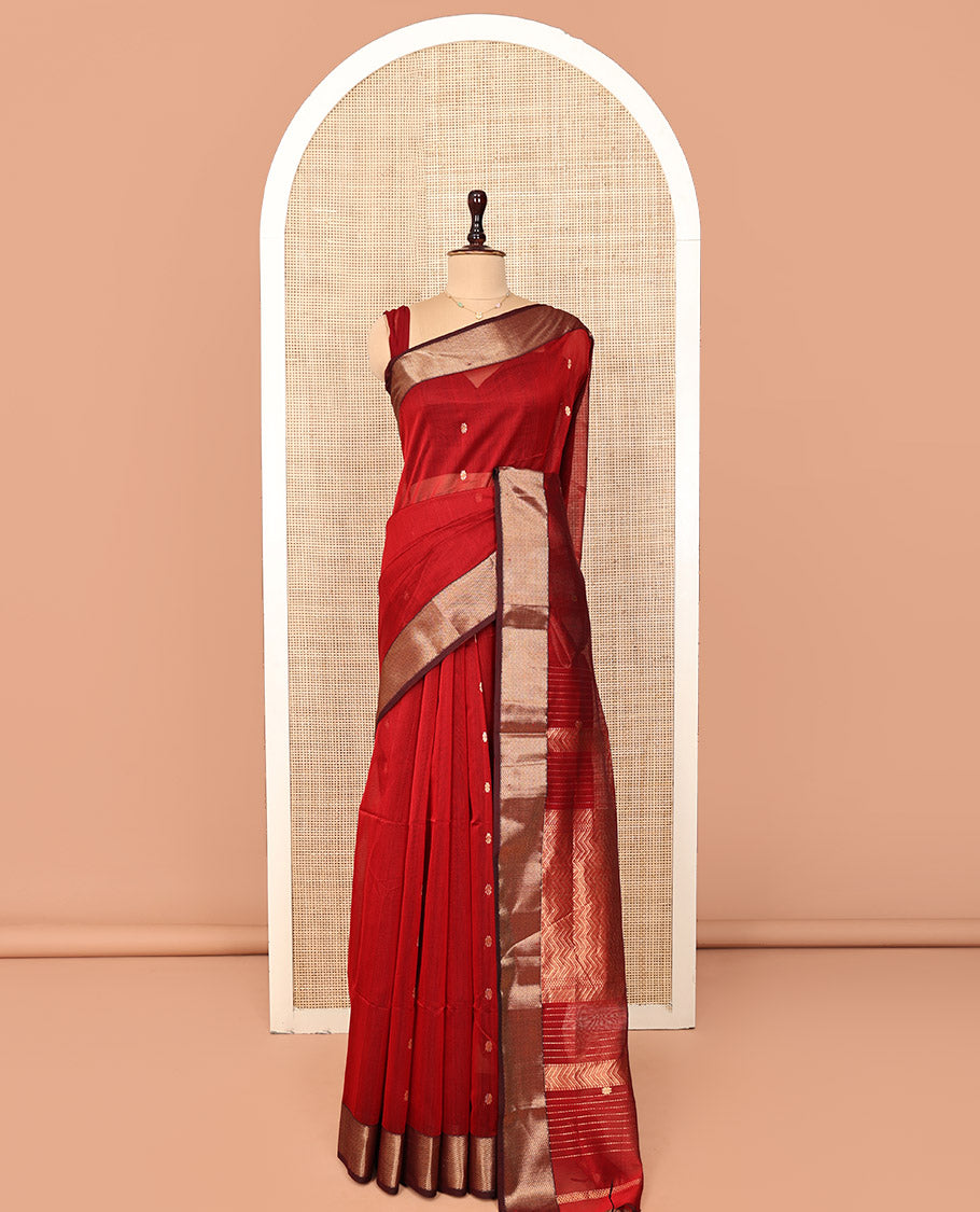Red Maheshwari Cotton Saree, Spotlighted with Floral Zari Buttas on Its Body, Complemented by a Contrast Chevron Striped Zari Border, Pallu Woven in Chevron Stripes in Zari, and Paired with a Matching Blouse