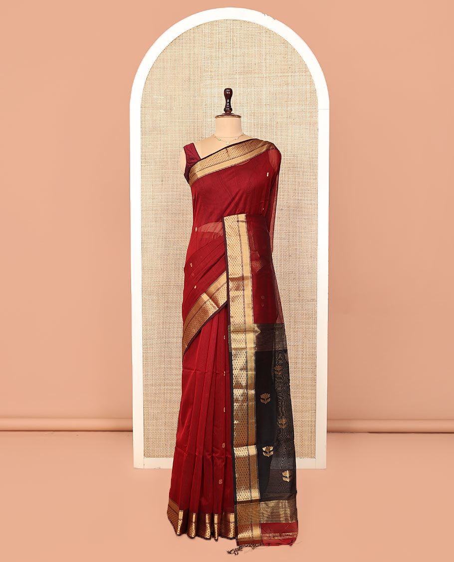 Red Maheshwari Cotton Saree, Accentuated with Zari Buttas All Over Its Body, Highlighted by a Traditional Zari Border, Captivating Contrast Pallu of Floral Designs, and Paired with a Contrast Blouse