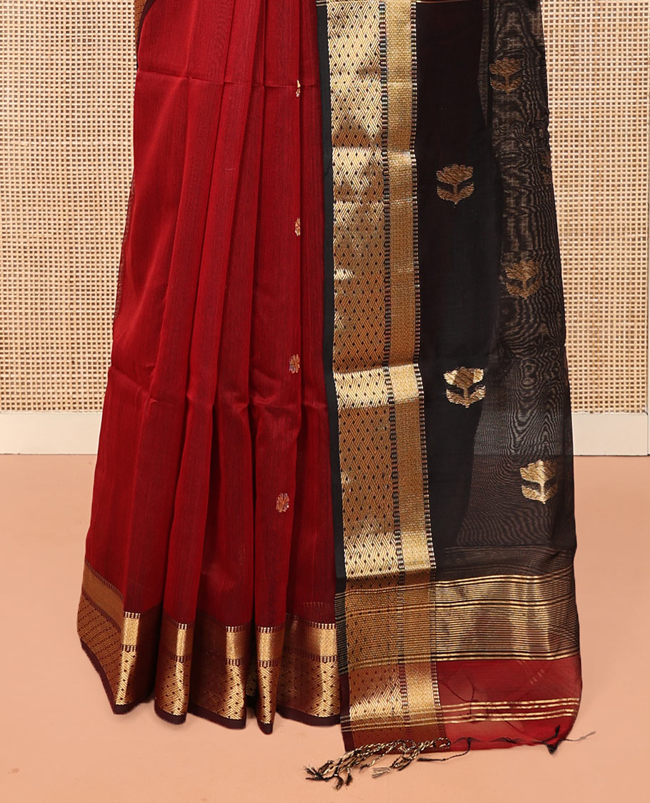 Red Maheshwari Cotton Saree, Accentuated with Zari Buttas All Over Its Body, Highlighted by a Traditional Zari Border, Captivating Contrast Pallu of Floral Designs, and Paired with a Contrast Blouse