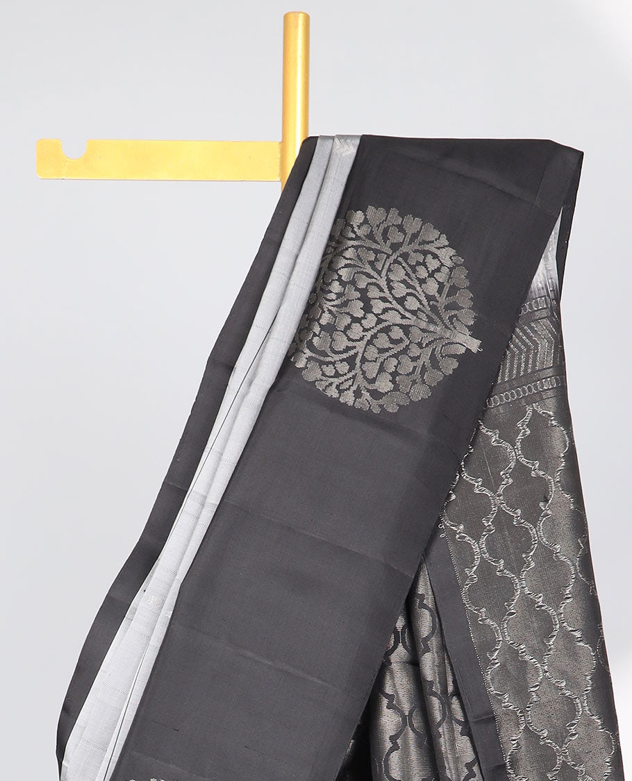 Grey checked Mayur soft silk saree with contrast leaf motifs border & argyle pattern pallu