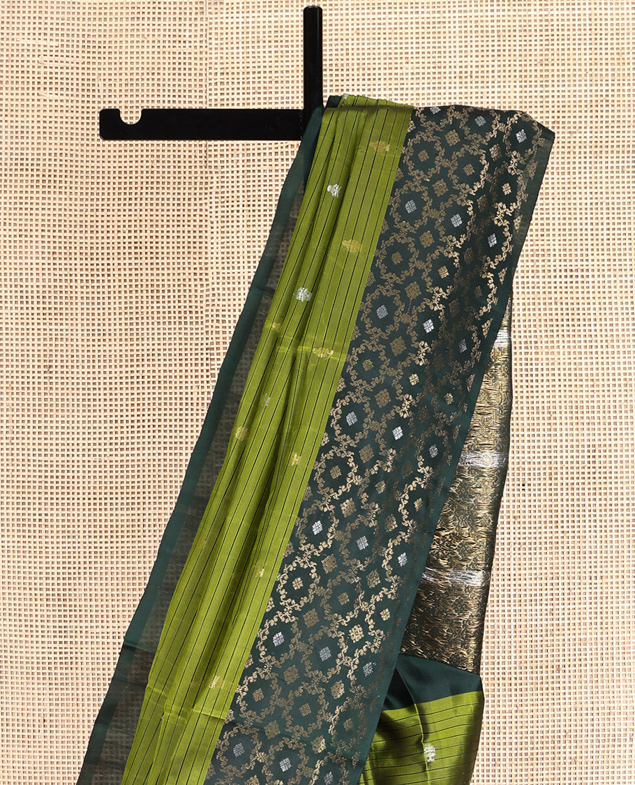 Green Mayuri Soft Silk Saree, Embellished with Buttas and Stripes, Complemented by a Contrast Jaal Border, Pallu of Jaal Designs, and a Contrast Blouse