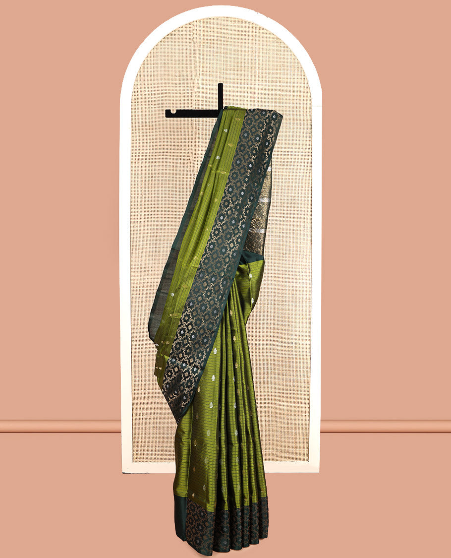 Green Mayuri Soft Silk Saree, Embellished with Buttas and Stripes, Complemented by a Contrast Jaal Border, Pallu of Jaal Designs, and a Contrast Blouse