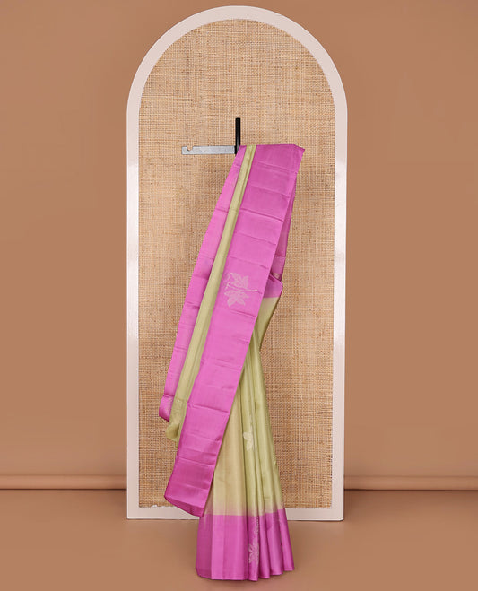 Light Sandal Mayuri Soft Silk Saree Sparsely Sparkled with Floral Zari Buttas All Over Its Body, Complemented by a Contrast Border of Floral Zari Designs, Majestically Detailed Pallu, and Paired with a Contrast Blouse