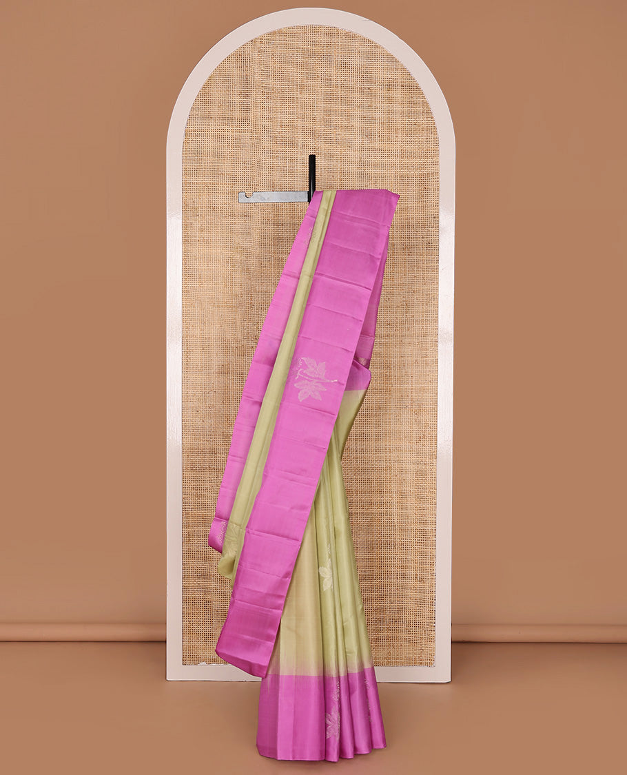 Light Sandal Mayuri Soft Silk Saree Sparsely Sparkled with Floral Zari Buttas All Over Its Body, Complemented by a Contrast Border of Floral Zari Designs, Majestically Detailed Pallu, and Paired with a Contrast Blouse