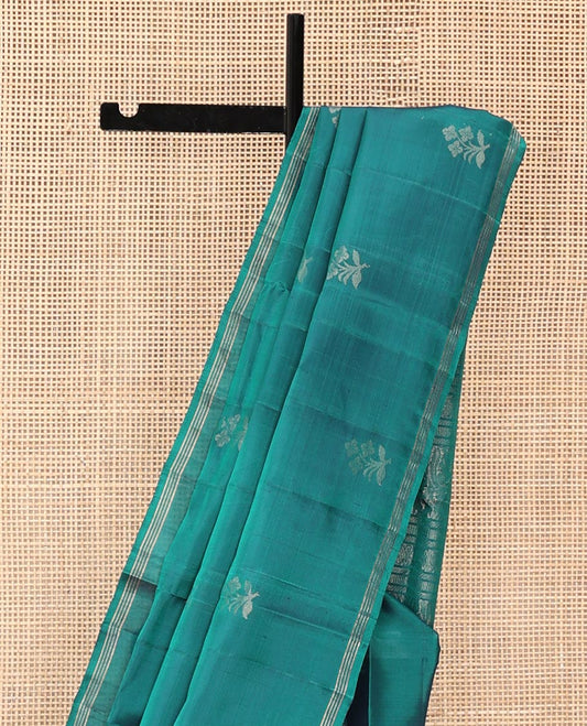 Green Mayuri Soft Silk Saree, Beautified with Floral Buttas All Over Its Body, Subtly Striped Border, Sparsely Woven Pallu, and Paired with a Matching Blouse