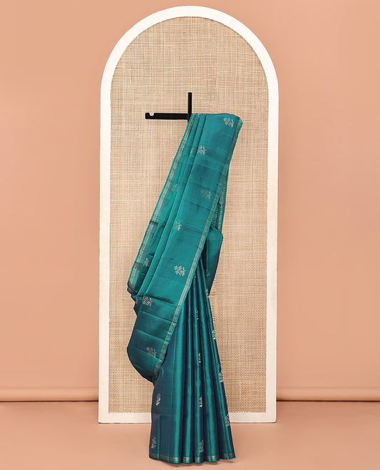 Green Mayuri Soft Silk Saree, Beautified with Floral Buttas All Over Its Body, Subtly Striped Border, Sparsely Woven Pallu, and Paired with a Matching Blouse