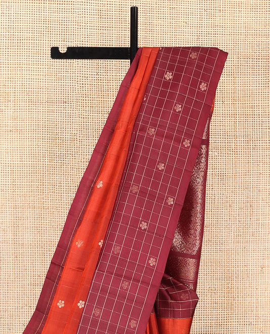 Orange Mayuri Soft Silk Saree, Beautified with Floral Buttas on Its Body, Complemented by Contrast Border of Butta Enclosed Checks, Subtle Pallu of Intricate Designs, and Paired with Contrast Blouse