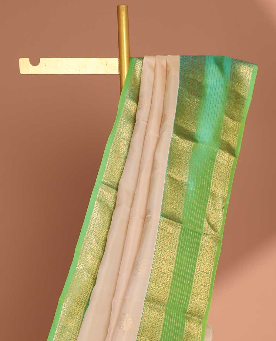 Cream buttas vasundhara elite silk saree with contrast zari design border & pallu of intricate zari design