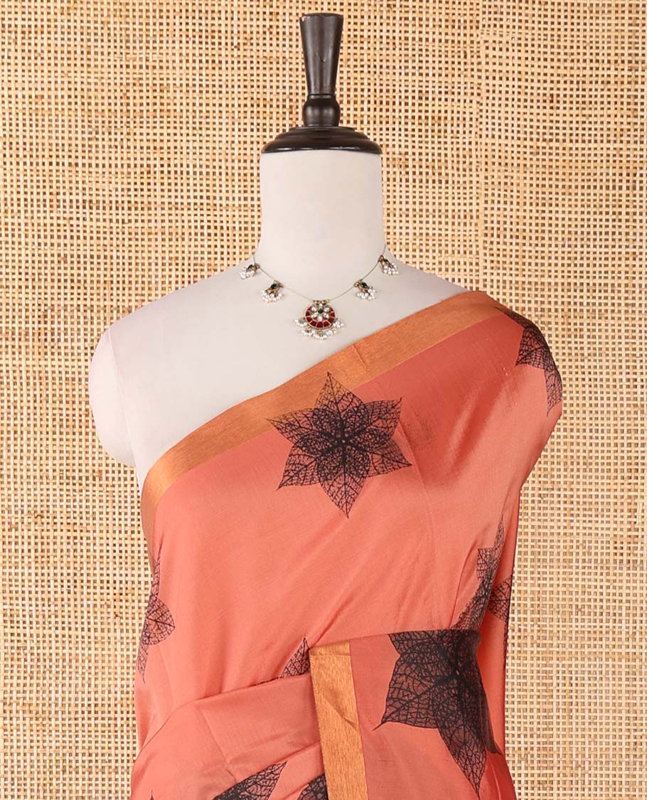 Pink six-petal-like leaf motifs printed micro-silk saree, copper zari border, contrast intricate pallu & plain blue blouse