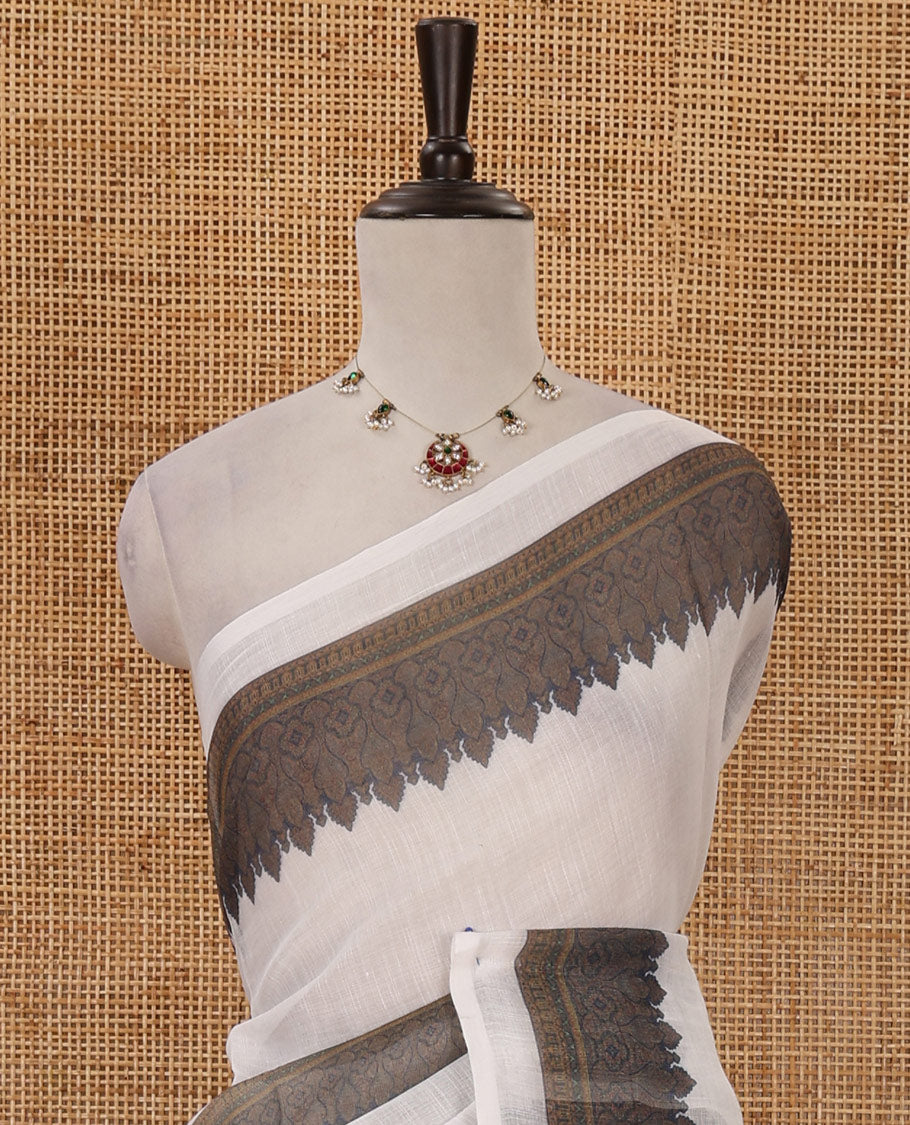White half-plain & half-printed body linen cotton saree, intricately printed border, printed pallu &  printed blouse