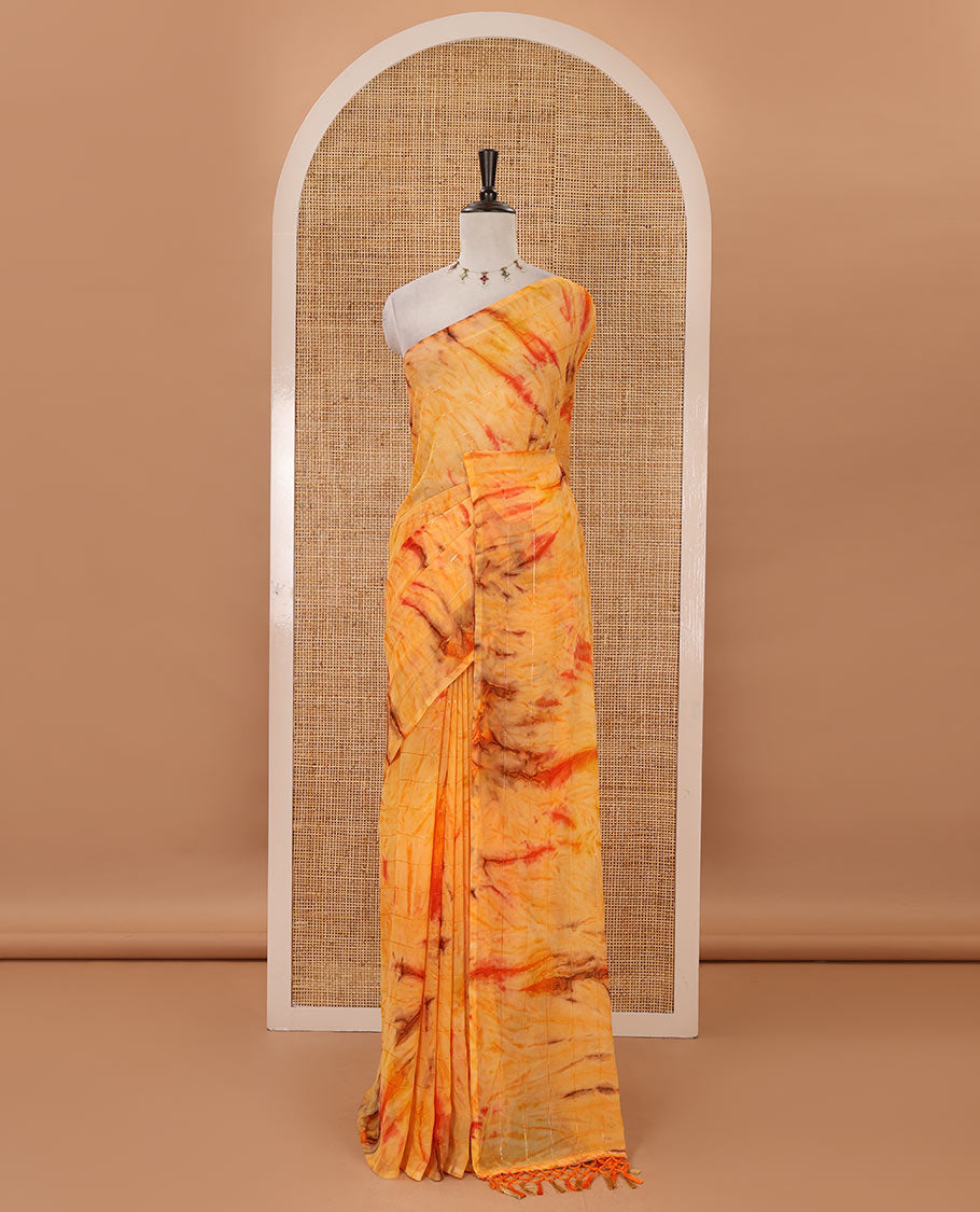 Borderless orange shibori-style printed & sequins work marble chiffon saree, self-pallu with tassels & contrast embroidered blouse