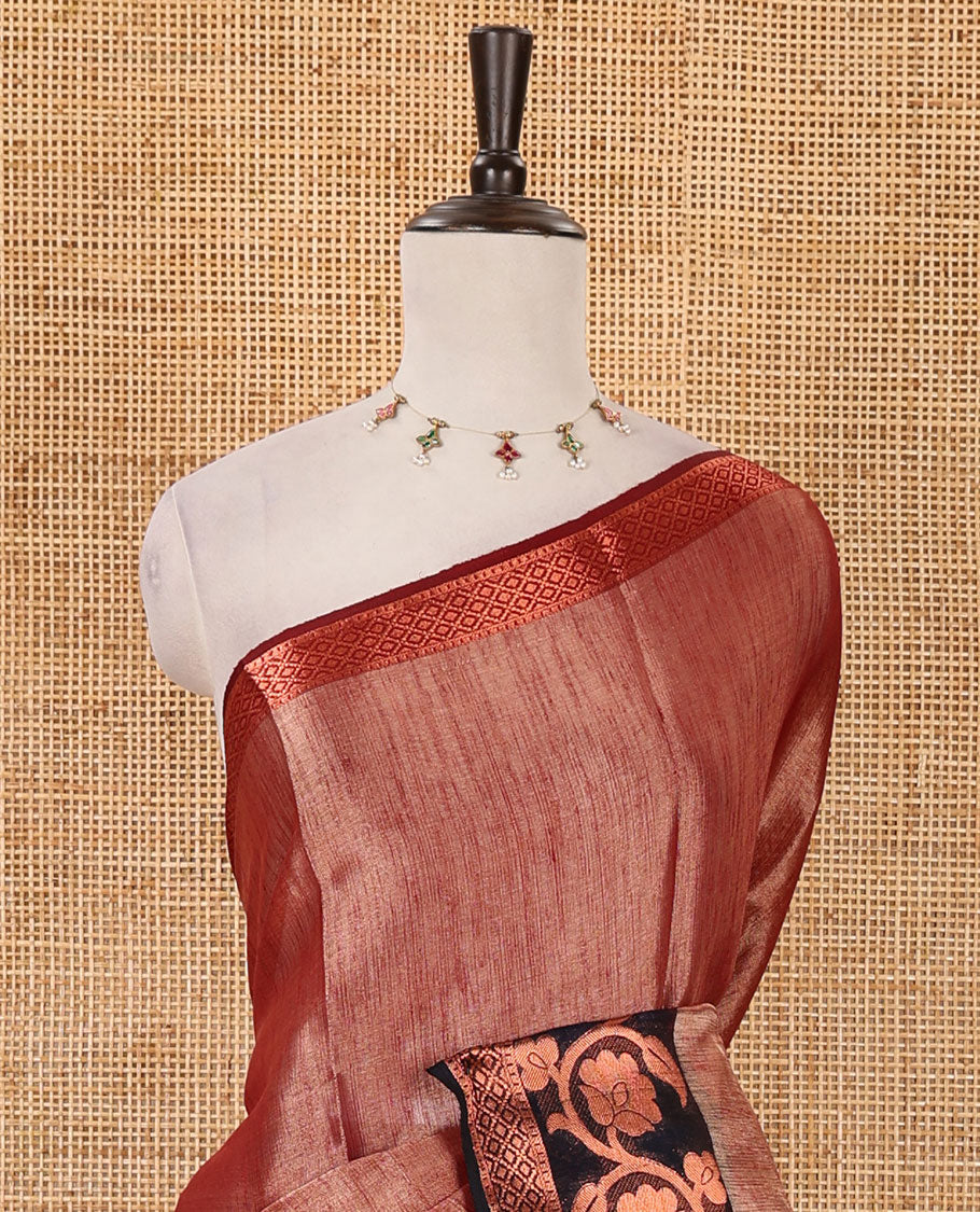Maroon plain tissue saree, contrast floral creeper & diamond patterned zari border, striped pallu & contrast plain blouse