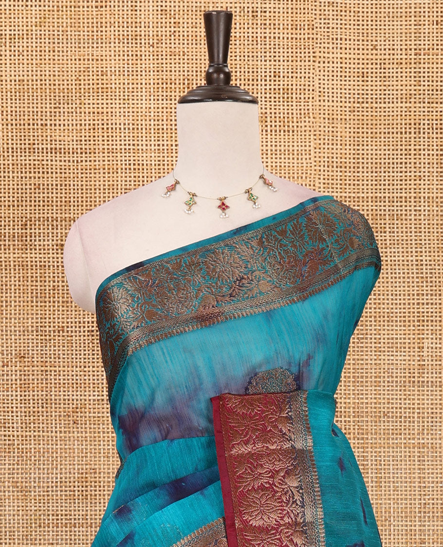 Rama blue all over zari butta with shibori-style printed jute cotton saree, contrast zari border, zari line weaving pallu & contrast blouse