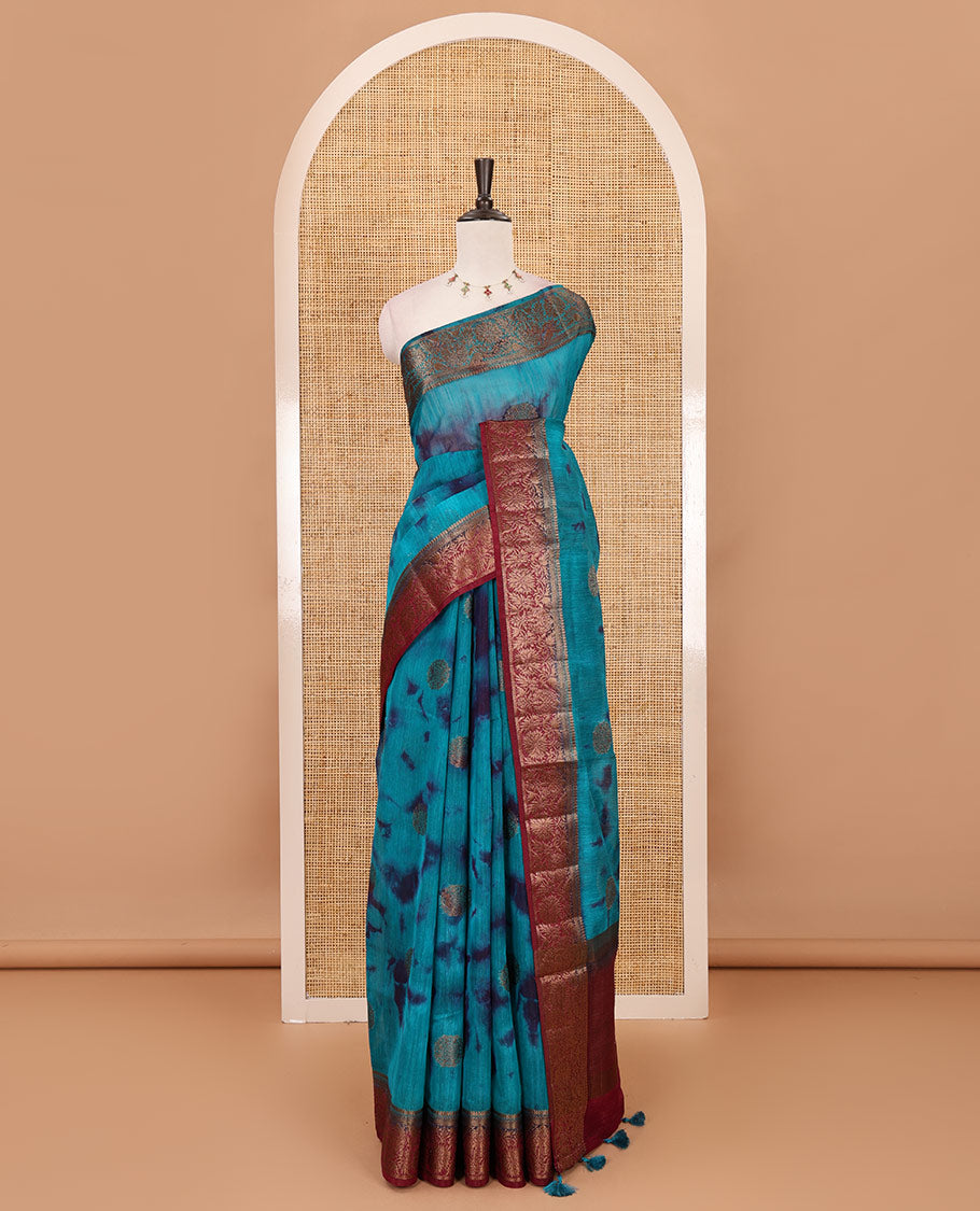 Rama blue all over zari butta with shibori-style printed jute cotton saree, contrast zari border, zari line weaving pallu & contrast blouse