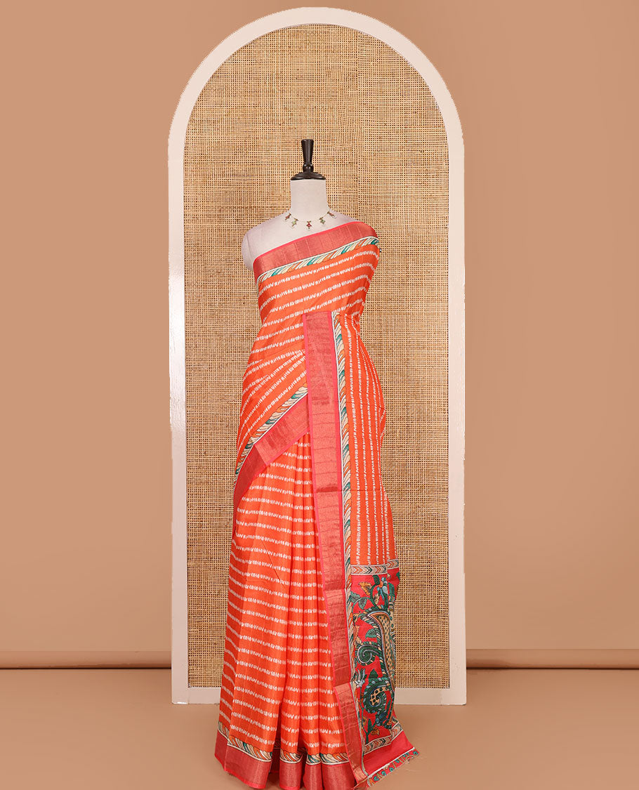 Orange shibori-style printed soft-tussar saree, contrast zari border, kalamkari peacock printed pallu & kalamkari floral vine print contrast blouse